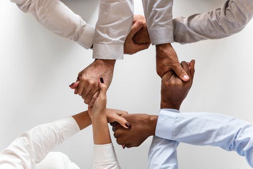 #buyblack stock photo interlocking hands